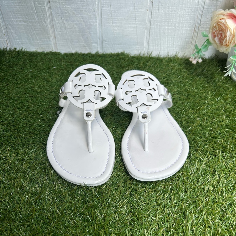 Tory Burch 
Miller cut-out leather flip-flops
$267 Sandals Sz 59 optical white - Picture 13 of 16